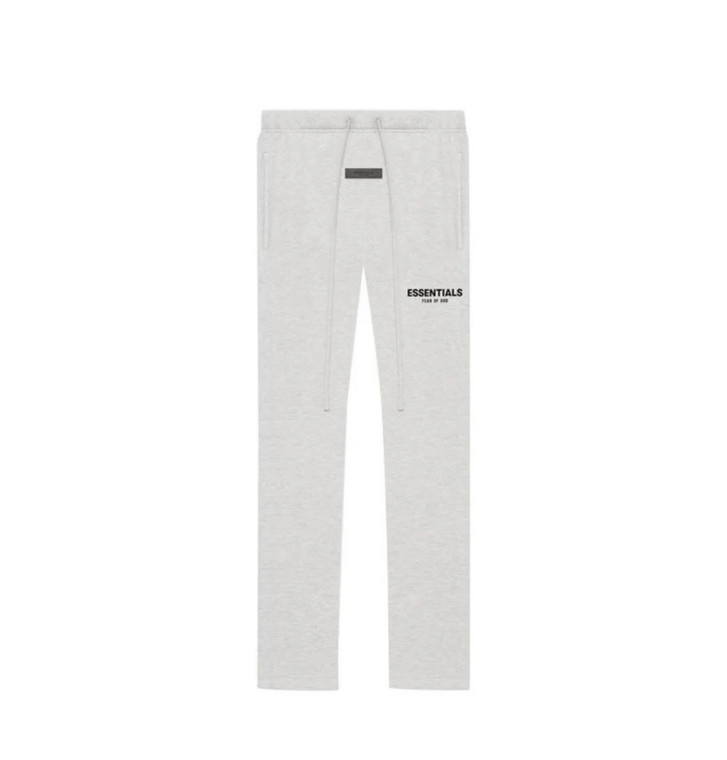 Light oatmeal relaxed pants with elastic waistband and side pockets, front view
