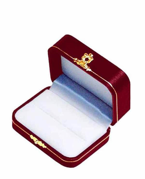 Dior red/burgundy leatherette exterior double slot ring box with white flock interior and gold tooling and latch.