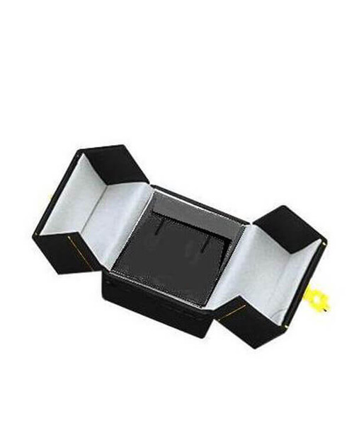 Black leatherette double door single small earring box with gold tooling and gold latch.