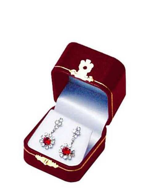 Dior red/burgundy leatherette exterior small earring or pendant box with white flock interior and gold tooling and latch.