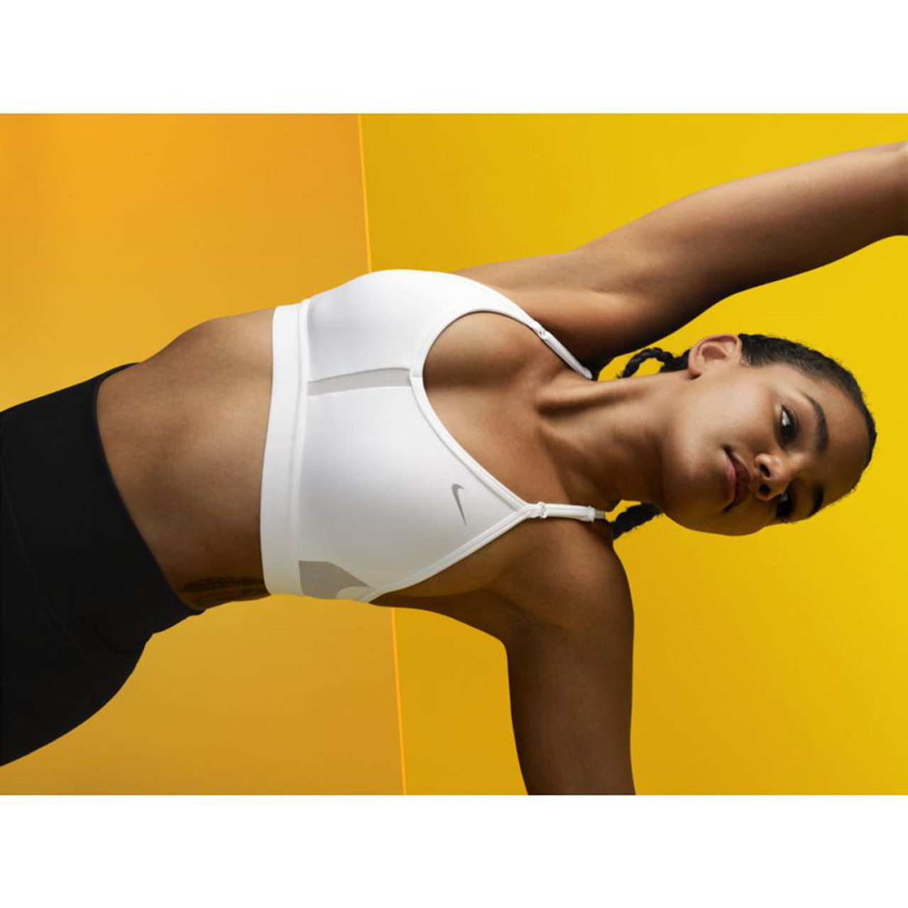 Nike Indy Light-Support Padded V-Neck Sports Bra The Nike Dri-FIT Indy  Sports Bra makes simple support even easier with straps that adjust in the  front. Soft fabric is designed for breathability on