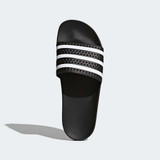 The Adidas Men's Adilette Slides in Black and White