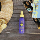 Sun Bum Blonde Tone Enhancer 4oz bottle angled view