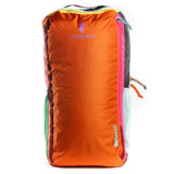 Cotopaxi Batac 16L Del Día Backpack in colorful patchwork design, angled view