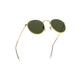 Ray-Ban Round Metal Sunglasses in gold frame with green lenses, angled view