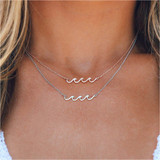 Pura Vida Delicate Wave Necklace in Rose Gold detail view