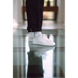 Clae Men's Bradley shoes in triple white leather, angled side view