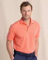 The Southern Tide Men's brrr°®-eeze Heather Performance Polo Shirt in Melon