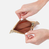 Hobo Carte Card Case in gold leather, front design angled view