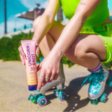 Unicorn Snot BioGlitter Sunscreen Lotion bottle displayed at an angle