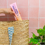 Unicorn Snot BioGlitter Sunscreen Lotion bottle displayed at an angle