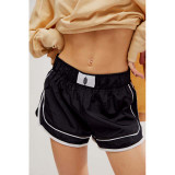 Free People Movement Women's Varsity Blues Shorts in Black colorway.
