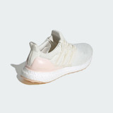 The Adidas fete Woman's Ultraboost 1.0 in the colorway Off White / Off White / Wonder Quartz