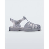 The Mini Melissa Little Kids Possession Shiny Sandal in the colorway Glitter Clear