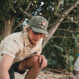 The Howler Brothers Men's Caracara Snapback Hat in the Oregano Colorway