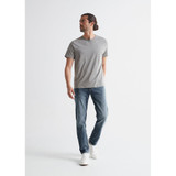 The DUER Men's Performance Denim Slim Fit Jeans in the Tidal Wash