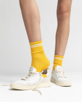 Oncept Women's Phoenix Sneakers in White Cloud worn on foot