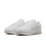 The Nike Women's Cortez Leather Shoes in Summit white and Light Silver