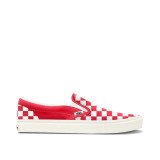 The Vans Classic Slip-on Checkerboard Shoes in Tomato Red