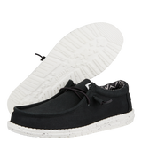 The HeyDude Men's Wally Stretch Canvas Shoes in Black and White