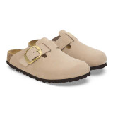 The Birkenstock Women's Boston Big Buckle Clogs in Sandcastle Beige Nubuck