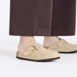 Birkenstock Women's Boston Big Buckle Clogs Sandcastle Beige Nubuck three-quarter view