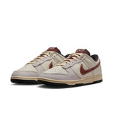 The Nike Men's Dunk Low Retro Shoes in Dark Brown and White