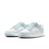 The Nike Women's Dunk Low Retro Shoes in Blue Tint and White