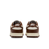 The Nike Women's Dunk Low Retro Shoes in White and Brown