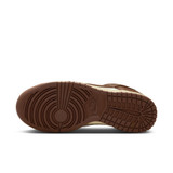 The Nike Women's Dunk Low Retro Shoes in White and Brown