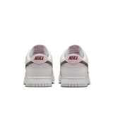 The Nike Women's Dunk Low Retro Shoes in Summit White and Plum Chalk