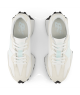 The New Balance Women's 327 Sneakers in White and Glint Blue