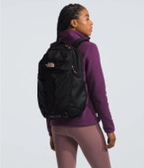 The North Face Women's Surge Luxe Backpack in TNF Black/Burnt Coral