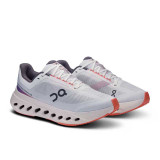 The On Running Cloudsurfer Next Running Shoes in White and Flame Colorway