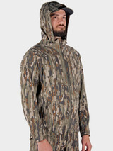 Duck Camp Men's Contact Softshell Jacket in Woodland Camo back view