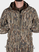 Duck Camp Men's Contact Softshell Jacket in Woodland Camo side view
