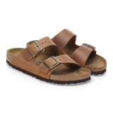 The Birkenstock Men's Arizona Sandals in Cognac Leather