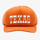 The You can buy the cap at KicksUSA in Burnt Orange and White
