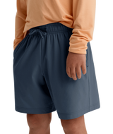 The Free Fly Youth Breeze Shorts in Storm Cloud Blue