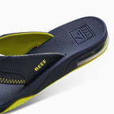 The Reef Kids' Fanning Sandal in the colorway Lime/ Navy