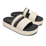 The Olukai Women's Pae Leather Slide Sandals in White Sand/Lava Rock