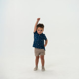 The Burlebo Toddlers' Performance Polo in the To The Moon Pattern