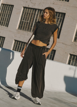 FP Movement Women's Hot Shot Crossover Set in Black full outfit