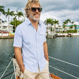 The Criquet Men's Performance Pearl Snap Shirt in Blue