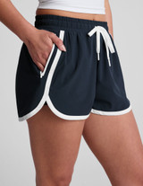 Beyond Yoga Women's Stretch Woven The Course 2.5" Shorts in Nocturnal Navy