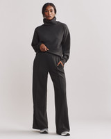 Rhone Women's Dream Glow Trousers in Black front view