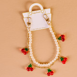 The Darling Effect Necklace Bag Charm in Cherried Away