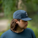 Texas Hill Country Provisions Sacred Ground Snapback Hat in Navy side angle