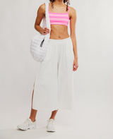 FP Movement Women's Tighten Up Reversible Bra in Hot Pink Combo full view