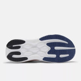 The New Balance Women's 1080v15 Running Shoes in Sea Salt and Blue Oyster